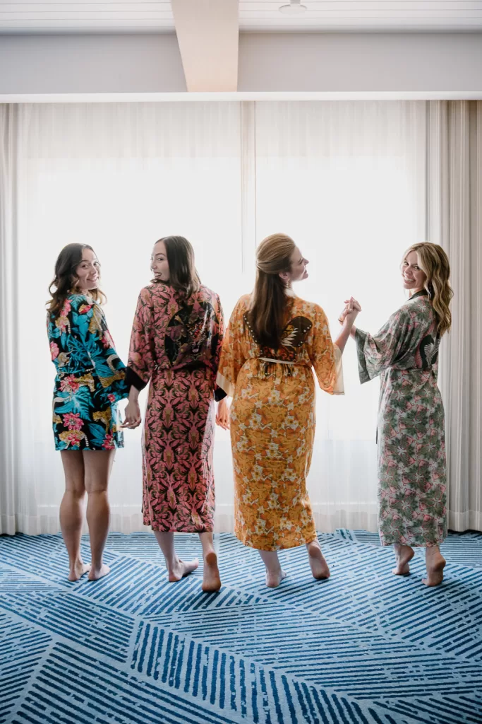 photo of 4 bridesmaids in colorful robes